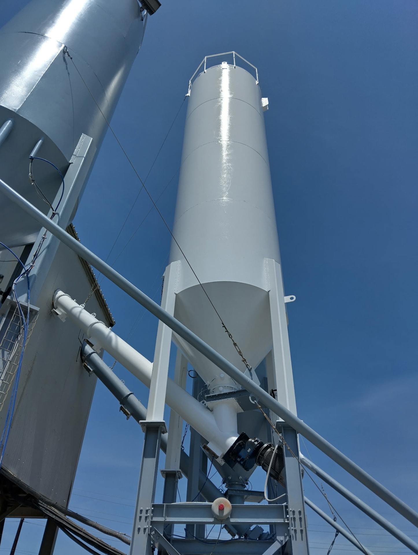 Freshly coated white storage silo